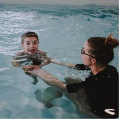 child in swimming lessons
